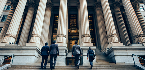 lawyers-formal-attire-walking-up-steps-grand-courthouse-with-columns-architectural-details-view